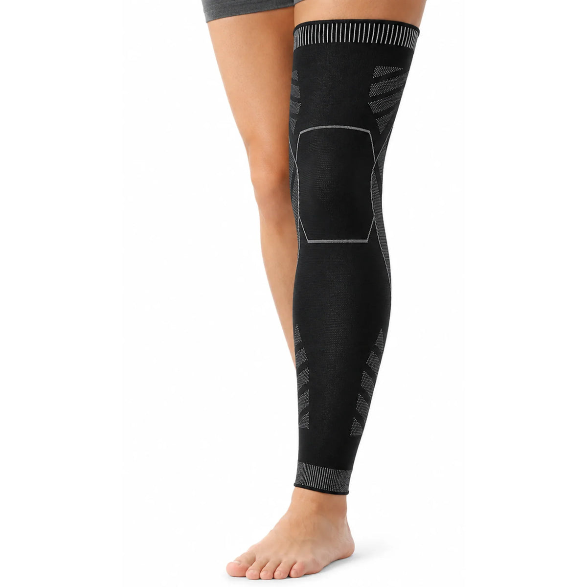Black compression leg sleeve with knee support for recovery and performance