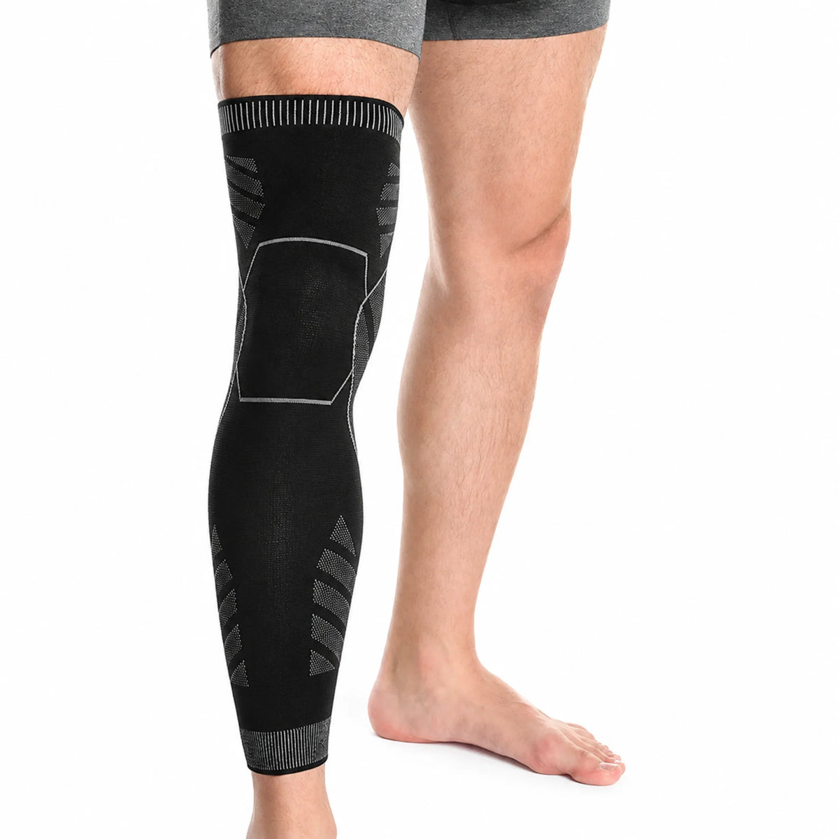 Black compression knee sleeve with gray accents for recovery and support during workouts